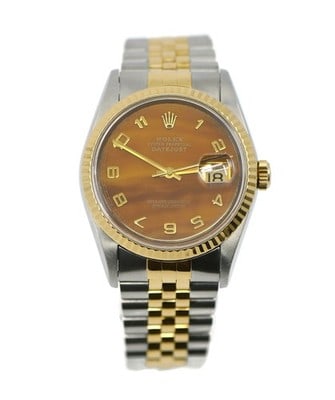 Rolex Datejust Tiger's Eye 16233 36mm Two Tone Watch: Rolex Datejust Tiger's Eye 16233 36mm Two Tone Watch This Rolex Datejust watch features a striking Tiger's Eye dial, complemented by an 18K gold and stainless steel case. The watch has a 36mm case siz