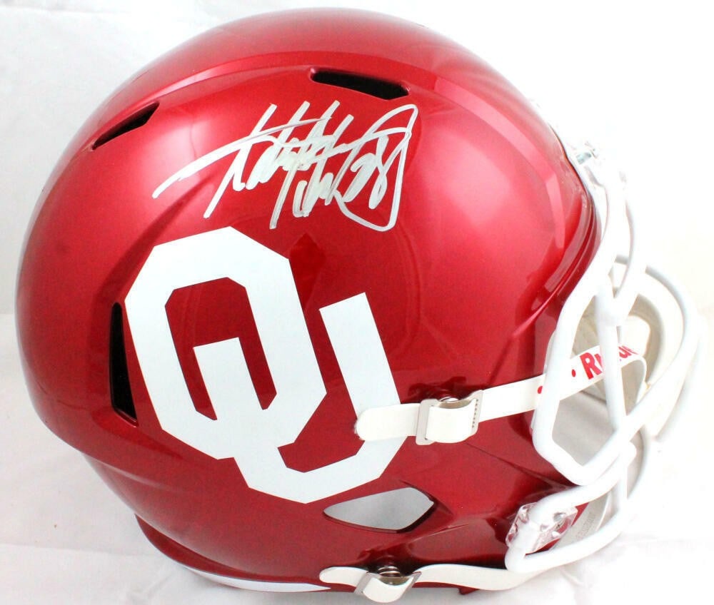 Adrian Peterson Signed Full Size Riddell Speed Oklahoma Sooners Helmet Beckett Authenticated: Adrian Peterson Signed Full Size Riddell Speed Oklahoma Sooners Helmet Beckett Authenticated This is a pre-owned full-size Riddell Speed helmet featuring the Oklahoma Sooners, autographed by Adrian Pe