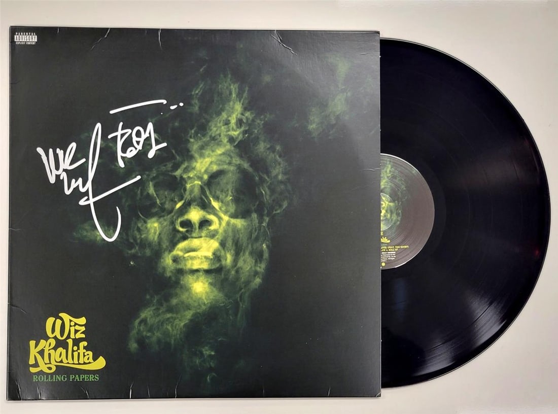 Wiz Khalifa Autographed Rolling Papers Album Cover Beckett Authenticated: Wiz Khalifa Autographed Rolling Papers Album Cover Beckett Authenticated This is an original Rolling Papers vinyl record album cover signed by Wiz Khalifa. The autograph is authenticated by Beckett an