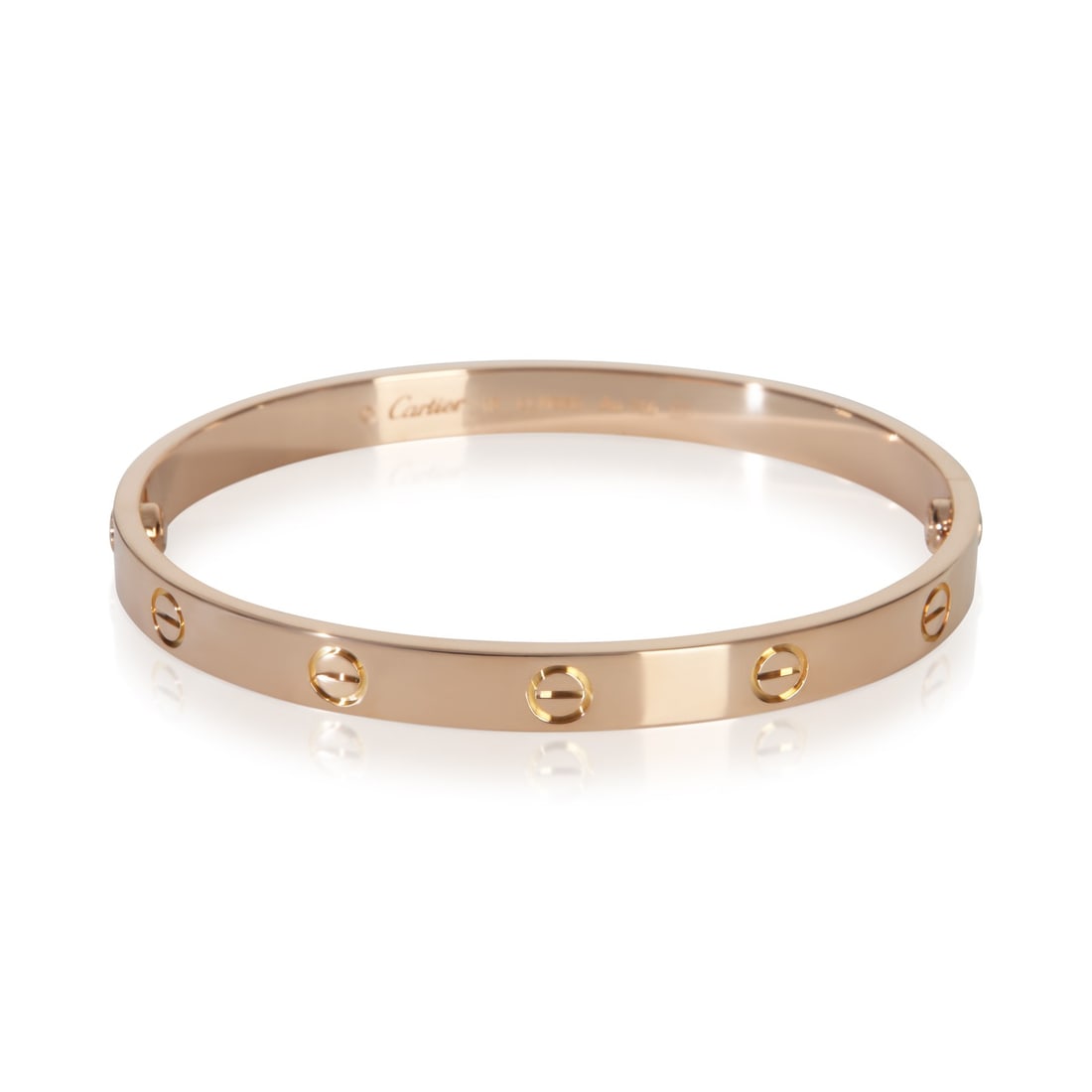 18k Rose Gold Cartier Love Bracelet with Box and Papers 18cm: 18k Rose Gold Cartier Love Bracelet with Box and Papers 18cm This pre-owned Cartier Love bracelet from the iconic Love collection is crafted in 18k rose gold with a pink hue. Designed for unisex wear,