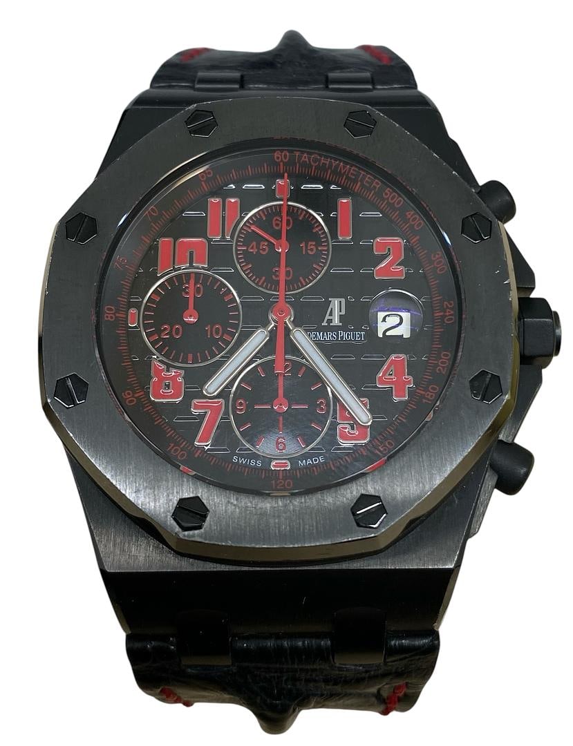 Royal Oak Offshore Ref 26186SN Black Dial Leather Watch with Papers: Royal Oak Offshore Ref 26186SN Black Dial Leather Watch with Papers This Audemars Piguet Royal Oak Offshore watch features a black dial and a leather bracelet. It is a men's timepiece with reference n