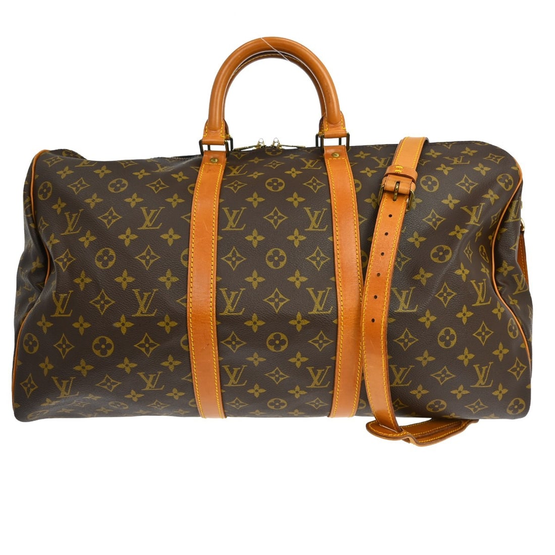 Louis Vuitton Monogram Canvas Keepall Bandouliere Unisex Travel Bag: Louis Vuitton Monogram Canvas Keepall Bandouliere Unisex Travel Bag The Louis Vuitton Keepall Bandouliere Bag features the iconic Monogram canvas in a unisex design. It showcases a spacious interior a