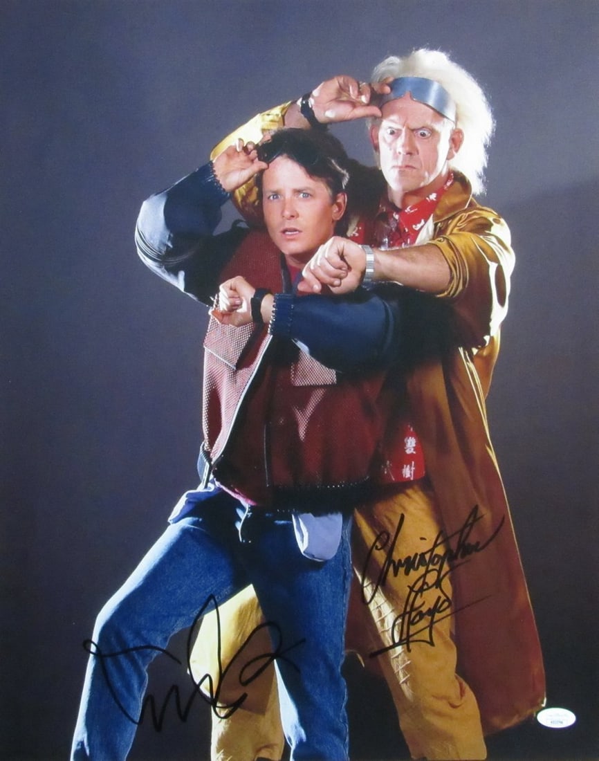 Michael J Fox Christopher Lloyd Autographed 16x20 Back to Future Photo JSA Authenticated: Michael J Fox Christopher Lloyd Autographed 16x20 Back to Future Photo JSA Authenticated This is an original, autographed 16x20 photo from the iconic film "Back to the Future," featuring the signature