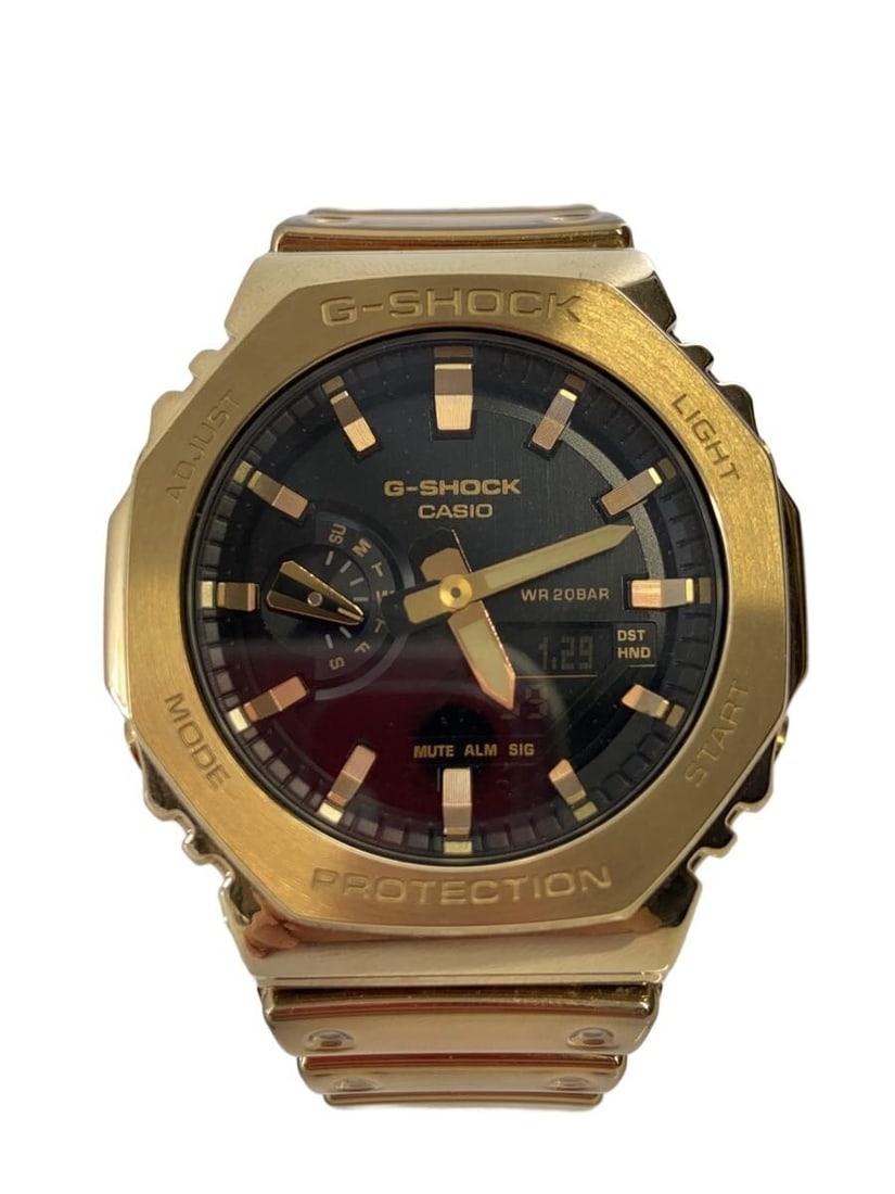 G Shock GM 2100YMG Black Men's Wristwatch CASIO: G Shock GM 2100YMG Black Men's Wristwatch CASIO This CASIO G-SHOCK GM-2100YMG men's wristwatch features a durable black case and band. Designed for men, it is made in Japan and remains in good pre-own