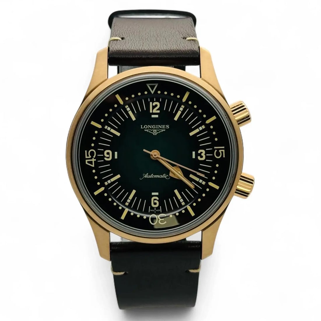 Legend Diver Automatic Bronze 42mm Watch With Green Dial By Longines: Legend Diver Automatic Bronze 42mm Watch With Green Dial By Longines This Longines Legend Diver wristwatch features a 42mm round bronze case with a brushed finish and a striking green dial. Powered by