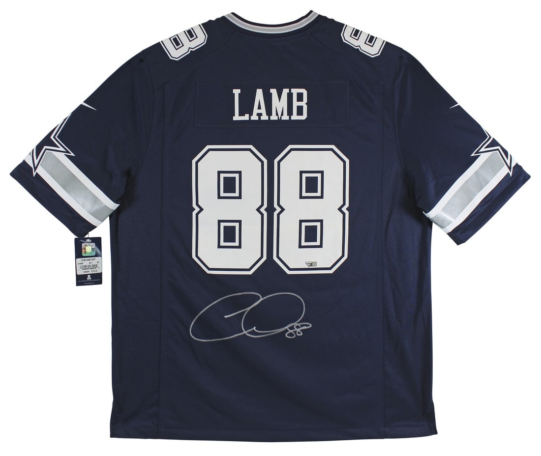 CeeDee Lamb Autographed Navy Nike Dallas Cowboys Jersey With Fanatics Authentication: CeeDee Lamb Autographed Navy Nike Dallas Cowboys Jersey With Fanatics Authentication This navy blue Nike jersey is personally autographed by CeeDee Lamb of the Dallas Cowboys. The signature has been a
