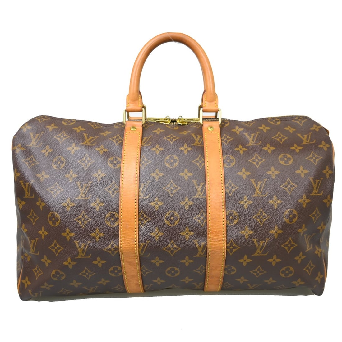 Louis Vuitton Monogram Keepall Brown Canvas Unisex Travel Bag 46cm: Louis Vuitton Monogram Keepall Brown Canvas Unisex Travel Bag 46cm This Louis Vuitton Keepall Bag features the iconic monogram canvas in brown and is designed for unisex use. It is a vintage item orig