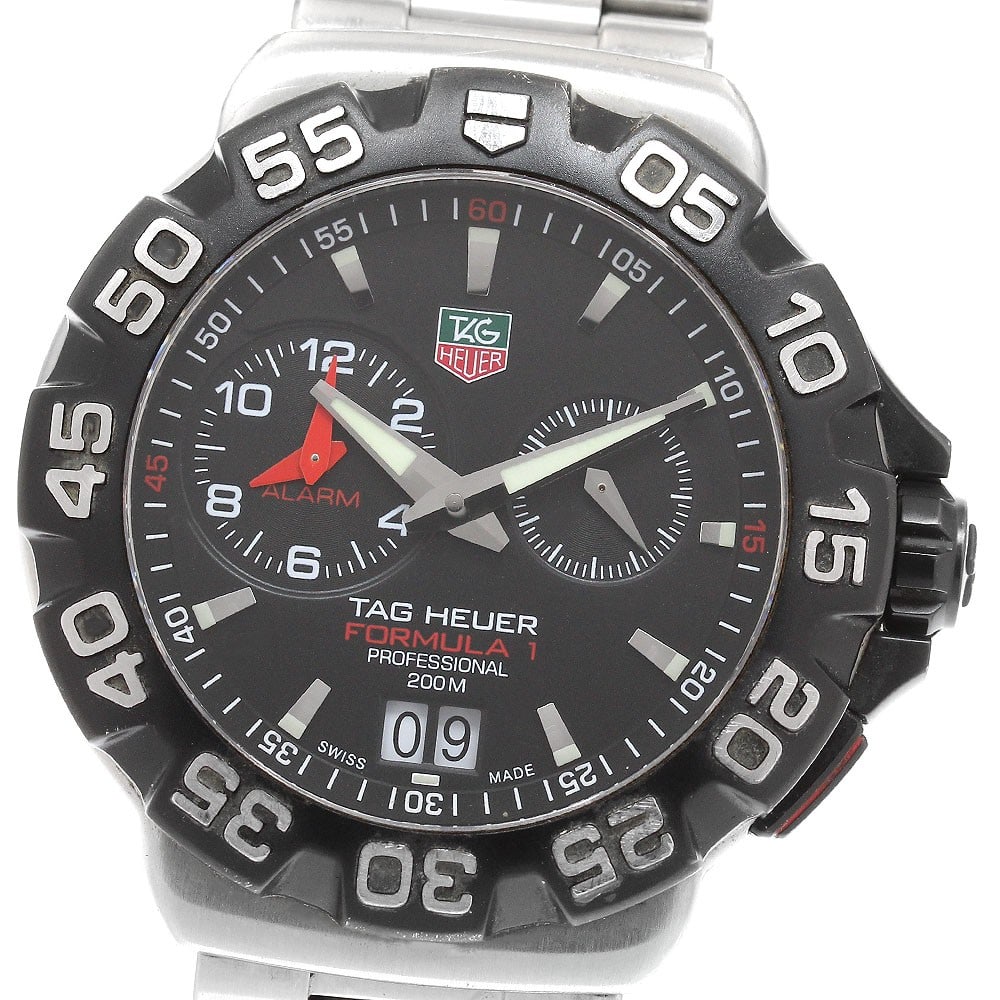 TAG Heuer Formula 1 Quartz Alarm Men's Wristwatch WAH111A: TAG Heuer Formula 1 Quartz Alarm Men's Wristwatch WAH111A This TAG Heuer Formula 1 Alarm Quartz men's wristwatch features a stainless steel case and bracelet with a black dial. The watch is powered by