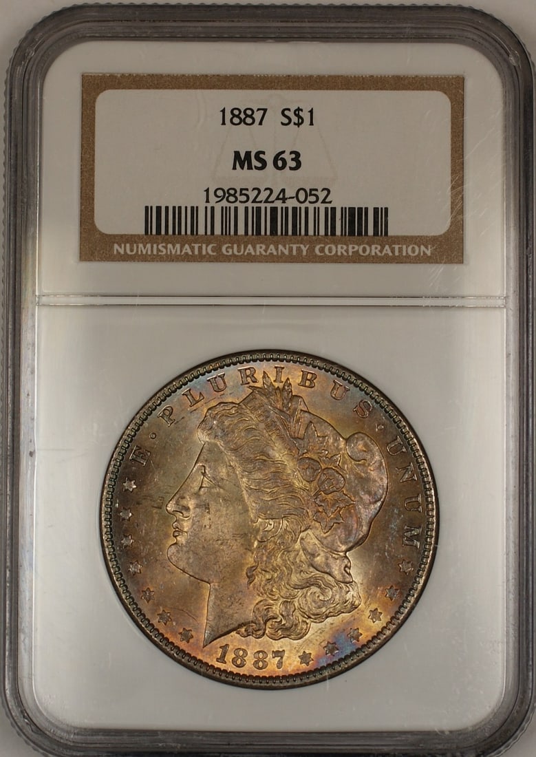 1887 NGC MS 63 Morgan Silver Dollar Nicely Toned Obverse Uncirculated: 1887 NGC MS 63 Morgan Silver Dollar Nicely Toned Obverse Uncirculated This 1887 Morgan Silver Dollar features a nicely toned obverse and has been certified by NGC with a grade of MS 63. Struck in Phil