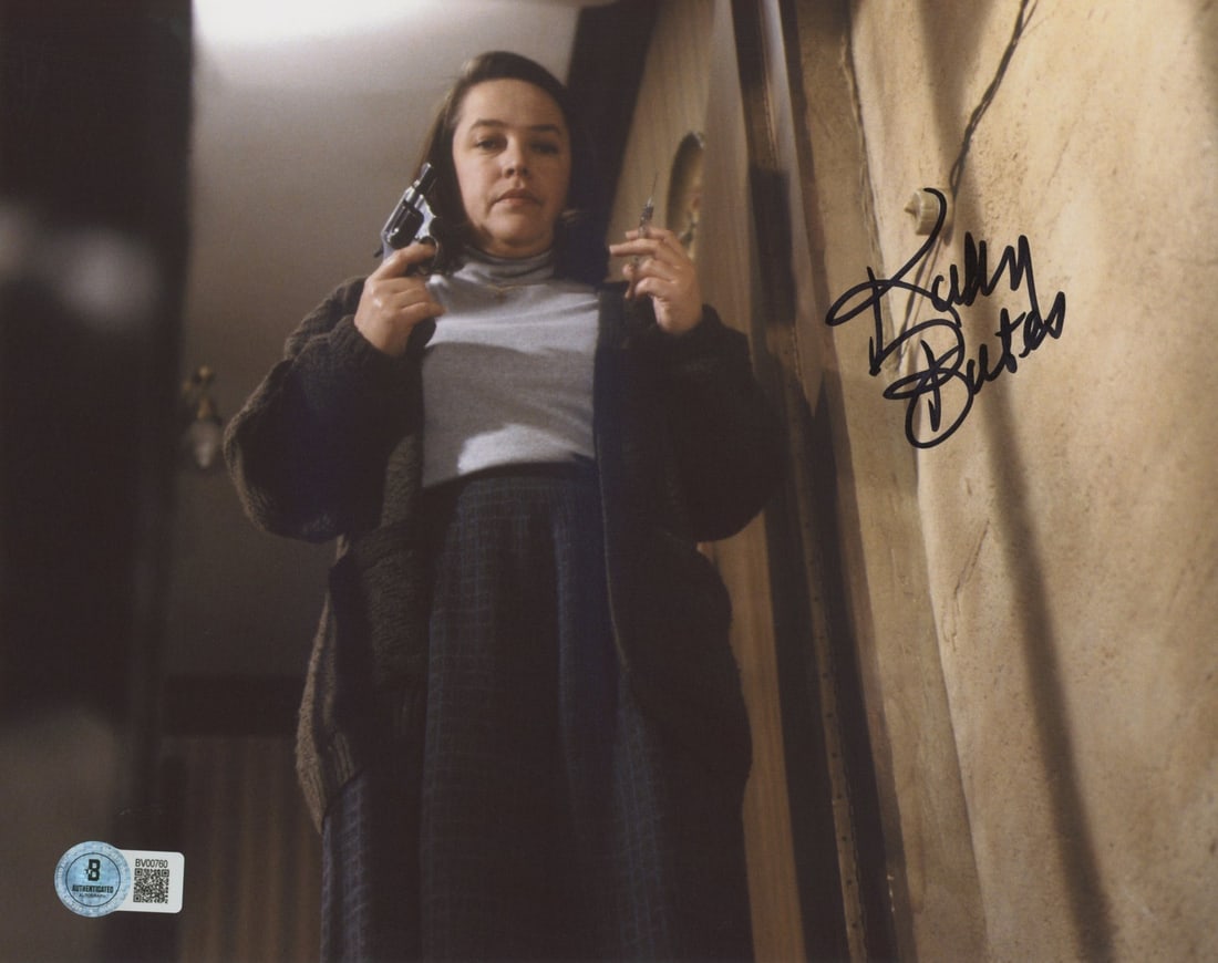 Kathy Bates Signed 8x10 Misery Photograph Beckett Authenticated: Kathy Bates Signed 8x10 Misery Photograph Beckett Authenticated This 8x10 photograph features an authentic signature from Kathy Bates, known for her role in the film Misery. The autograph is verified 
