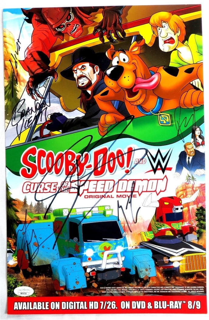 Scooby-Doo WWE Speed Demon Autographed Poster 6 Signatures JSA: Scooby-Doo WWE Speed Demon Autographed Poster 6 Signatures JSA This original Scooby-Doo! WWE Speed Demon poster measures approximately 10" x 15" and features the autographs of notable personalities fr