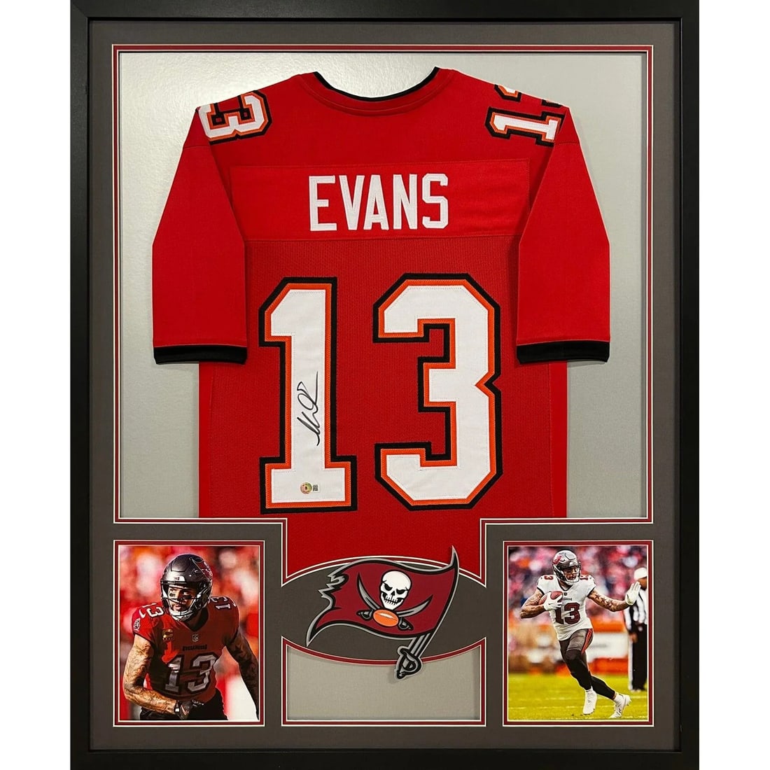 Mike Evans Autographed Framed Jersey Tampa Bay Buccaneers Beckett Authenticated: Mike Evans Autographed Framed Jersey Tampa Bay Buccaneers Beckett Authenticated This autographed Mike Evans jersey from the Tampa Bay Buccaneers is a must-have for any football fan. The jersey is prof