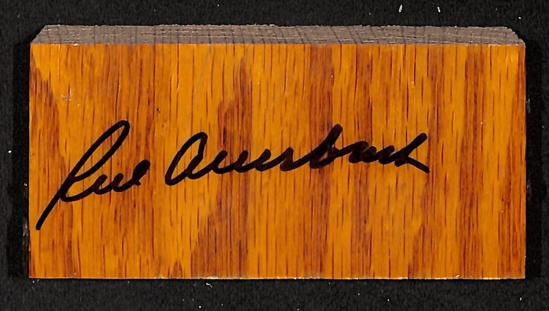 Boston Garden Floor Section Signed by Red Auerbach with PSA DNA Authentication: Boston Garden Floor Section Signed by Red Auerbach with PSA DNA Authentication This authentic piece of Boston Garden parquet floor measures 4" x 2" x 1" and is personally autographed by Celtics legend