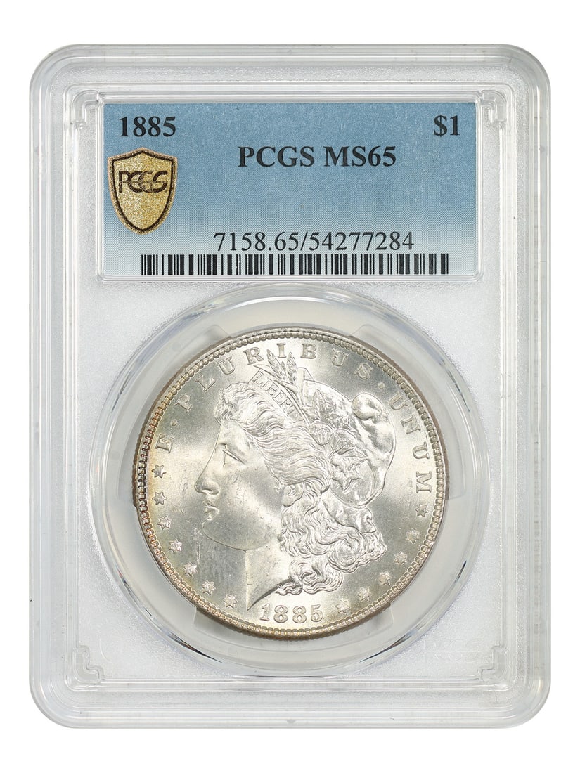 1885 Morgan Silver Dollar PCGS MS65 Graded Uncirculated Coin: 1885 Morgan Silver Dollar PCGS MS65 Graded Uncirculated Coin This 1885 Morgan Dollar was struck at the Philadelphia Mint and is graded MS65 by PCGS. It is an uncirculated coin and remains a sought-aft
