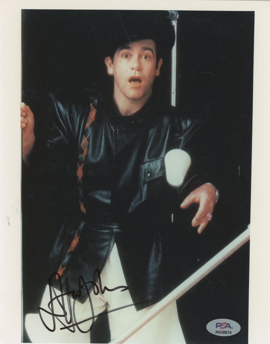 Elton John Signed 8x10 Photo Autographed PSA/DNA Certified: Elton John Signed 8x10 Photo Autographed PSA/DNA Certified This authentic 8x10 photograph of Elton John has been personally signed by the legendary musician himself. The photograph is accompanied by a