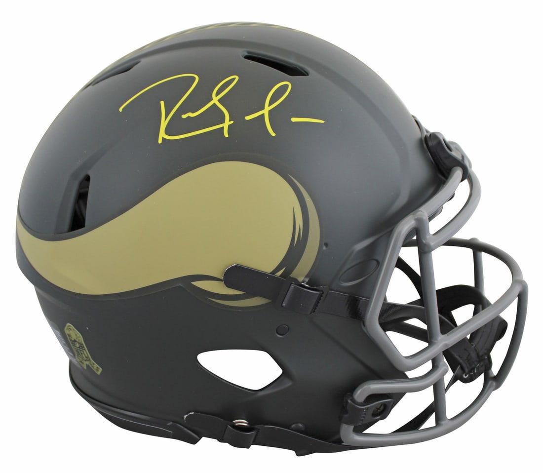 Randy Moss Signed Minnesota Vikings Salute to Service IV Helmet BAS Authenticated: Randy Moss Signed Minnesota Vikings Salute to Service IV Helmet BAS Authenticated This authentic full-size speed Proline helmet is a remarkable collectible, personally signed by Randy Moss, the legend