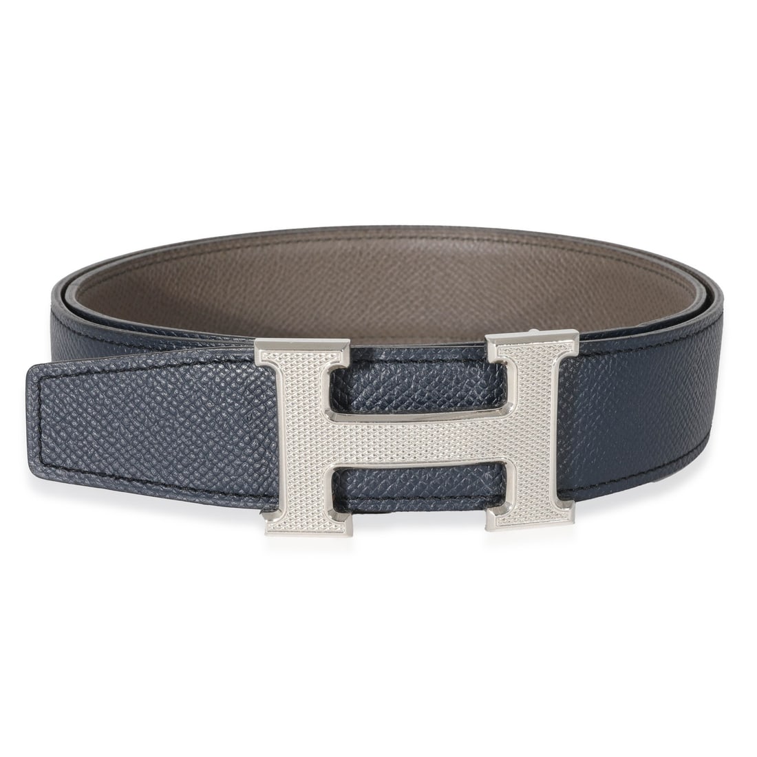 H Guilloche Leather Belt by Hermes in Etain and Bleu De Prusse Size 80: H Guilloche Leather Belt by Hermes in Etain and Bleu De Prusse Size 80 This Hermes H Guilloche belt features Epsom leather in a neutral tone with a contrasting Bleu De Prusse blue leather lining. The 