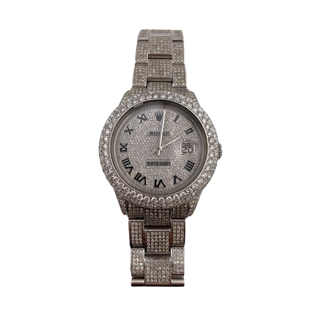 Rolex Datejust Ref 1601 Diamond Roman Dial Jubilee Bracelet Men's Watch: Rolex Datejust Ref 1601 Diamond Roman Dial Jubilee Bracelet Men's Watch This is a men's Rolex Datejust watch featuring a diamond Roman numeral dial and a diamond bezel. The watch comes with a Jubilee 
