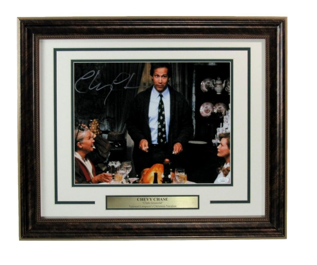 Chevy Chase Signed 11x14 Framed Photo Christmas Vacation JSA Authenticated: Chevy Chase Signed 11x14 Framed Photo Christmas Vacation JSA Authenticated This is a framed 11x14 photo of Chevy Chase from the classic film "Christmas Vacation," personally autographed by the actor. 
