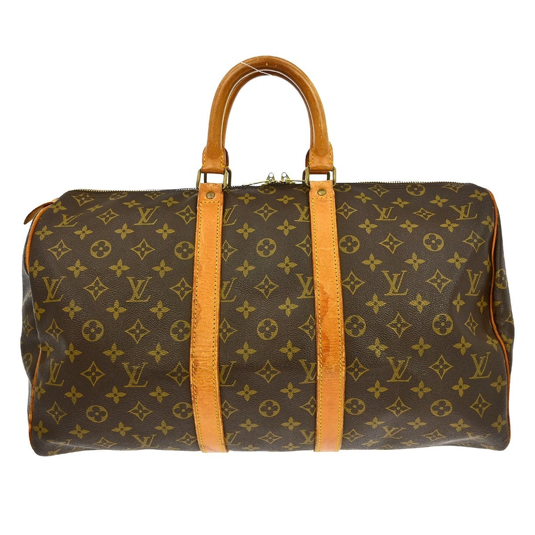 Monogram Canvas Keepall Travel Bag by Louis Vuitton Unisex: Monogram Canvas Keepall Travel Bag by Louis Vuitton Unisex The Louis Vuitton Keepall Bag features the iconic Monogram Canvas in brown, designed for unisex use. This bag shows signs of wear, including 