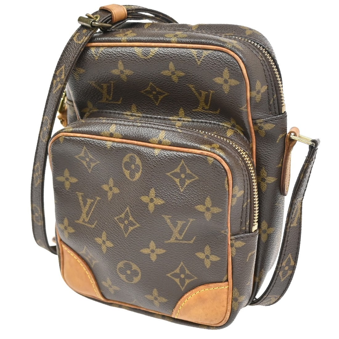 Amazone Crossbody Brown Canvas Shoulder Bag by Louis Vuitton: Amazone Crossbody Brown Canvas Shoulder Bag by Louis Vuitton The Louis Vuitton Amazone Bag is crafted from brown monogram canvas and designed for unisex use. Made in France, this bag features a gold-p
