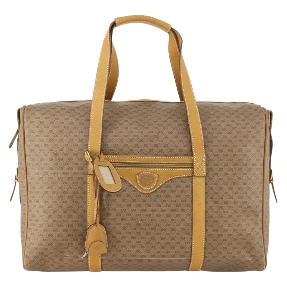 Vintage Gucci Unisex Beige PVC GG Canvas Travel Bag 43cm: Vintage Gucci Unisex Beige PVC GG Canvas Travel Bag 43cm This Gucci vintage travel bag features the iconic GG canvas in beige, crafted from durable PVC. Designed for unisex use, the bag showcases clas