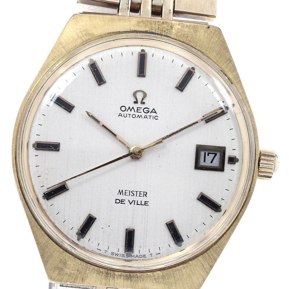 Omega De Ville Automatic Date Men's Wristwatch: Omega De Ville Automatic Date Men's Wristwatch This OMEGA De Ville Date men's wristwatch features a stainless steel and gold case and bracelet, with a silver dial and automatic movement. The watch inc