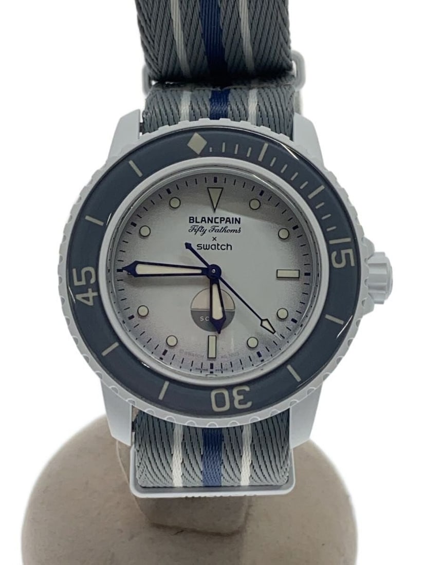 Blancpain x Swatch Antarctic Ocean Ceramic Wristwatch: Blancpain x Swatch Antarctic Ocean Ceramic Wristwatch This BLANCPAINxSWATCH Antarctic Ocean men's wristwatch features a silver-tone ceramic case and band. Designed in Switzerland, it is in slightly us