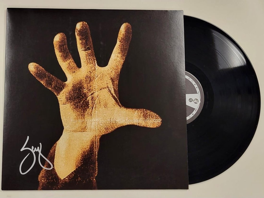 System of a Down Record Album Cover Signed by Serj Tankian Beckett Authenticated: System of a Down Record Album Cover Signed by Serj Tankian Beckett Authenticated This is a pre-owned System of a Down vinyl album cover signed by Serj Tankian. The autograph has been authenticated by 