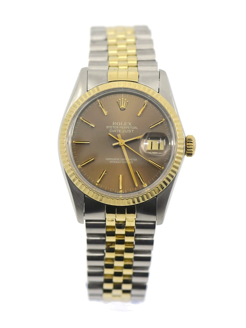 Datejust Model 16013 Wristwatch in 18K and Stainless Steel with Box: Datejust Model 16013 Wristwatch in 18K and Stainless Steel with Box This Rolex Datejust wristwatch features a 36mm stainless steel case with 18K gold accents and a brown dial. Manufactured in 1981, it