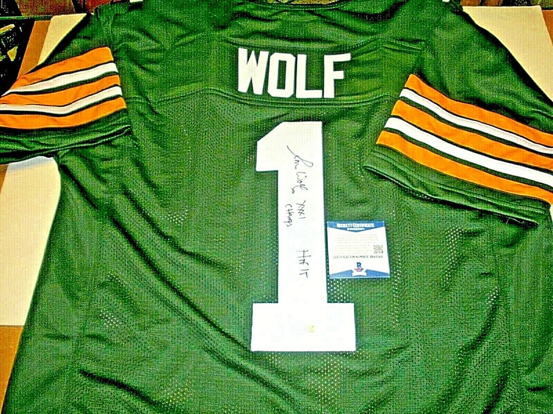 Signed Ron Wolf Green Bay Packers Jersey with Beckett COA and HOF 2015 Inscription: Signed Ron Wolf Green Bay Packers Jersey with Beckett COA and HOF 2015 Inscription This is a pre-owned Green Bay Packers jersey signed by Ron Wolf, commemorating his induction into the Hall of Fame in
