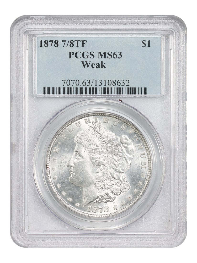 1878 Morgan Dollar 7 Over 8 Tail Feather Weak Variety PCGS MS63: 1878 Morgan Dollar 7 Over 8 Tail Feather Weak Variety PCGS MS63 This 1878 Morgan Dollar features the sought-after 7 over 8 tail feather variety in a weak die state. Graded MS63 by PCGS, it is an uncir