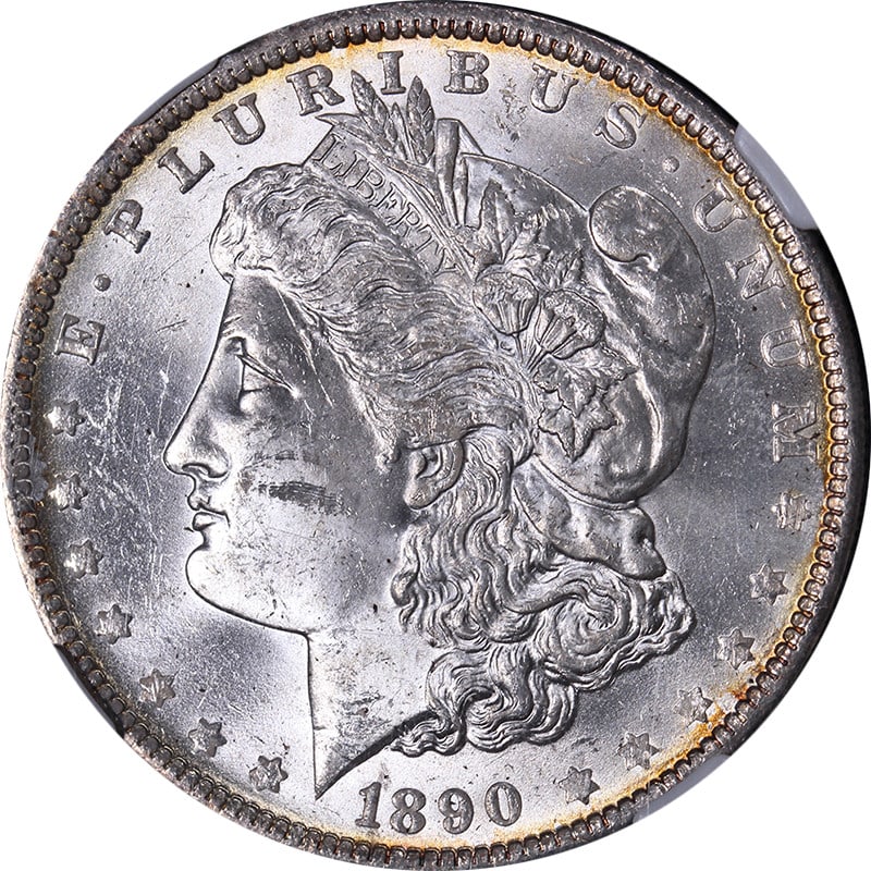 1890-O Morgan Silver Dollar NGC MS63 Uncirculated Silver Coin: 1890-O Morgan Silver Dollar NGC MS63 Uncirculated Silver Coin This 1890-O Morgan Silver Dollar showcases remarkable eye appeal with its impressive luster and striking details. Graded MS63 by NGC, this