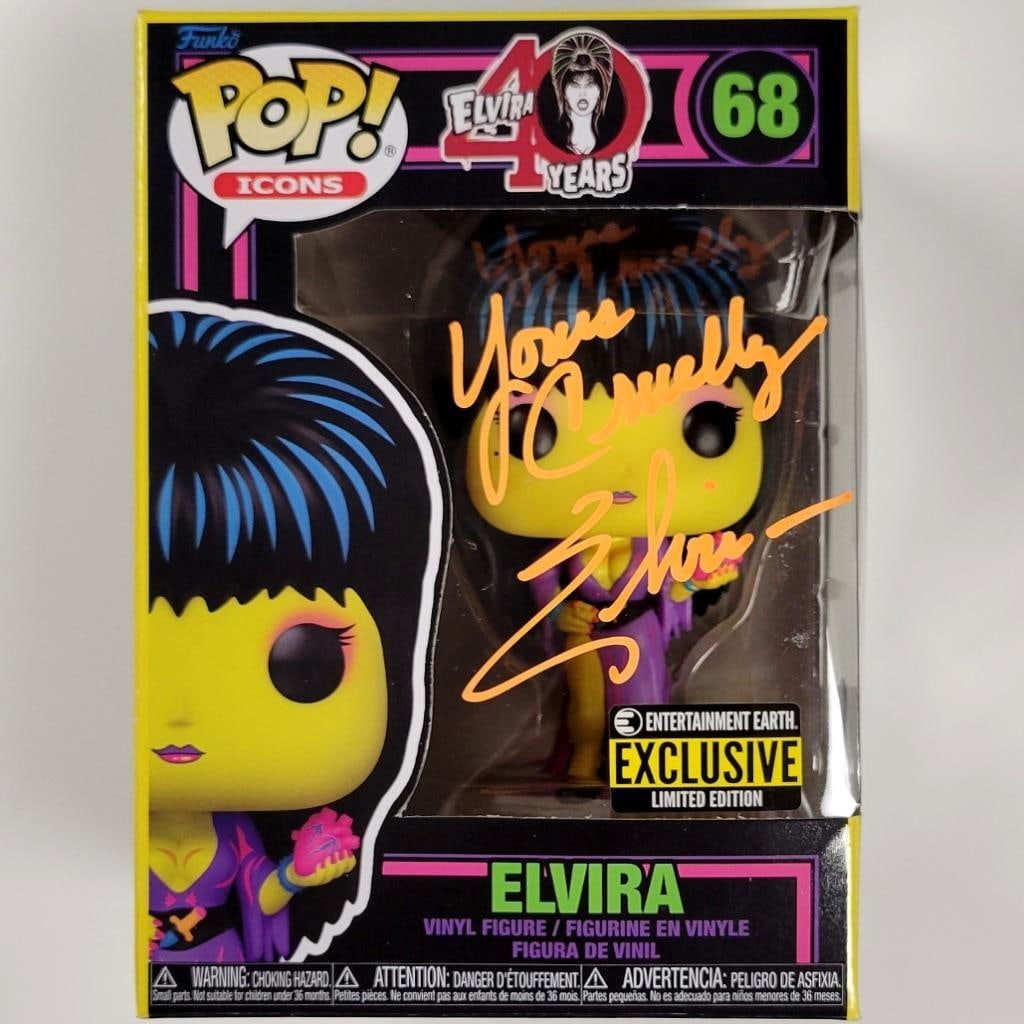 Cassandra Peterson Beckett Authenticated Elvira Black Light Funko Pop Signed Figure: Cassandra Peterson Beckett Authenticated Elvira Black Light Funko Pop Signed Figure This original Funko Pop collectible features the character Elvira from Mistress of the Dark. The item is hand-signed