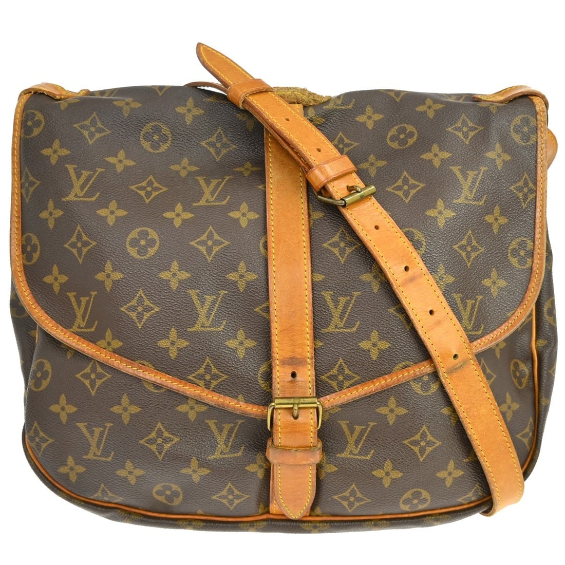 Monogram Canvas Saumur Shoulder Bag by Louis Vuitton: Monogram Canvas Saumur Shoulder Bag by Louis Vuitton This is a Louis Vuitton Saumur Handbag crafted in brown monogram canvas. Designed for unisex use, the bag features leather trim and displays signs 