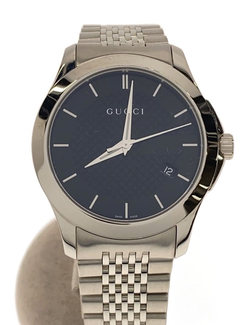 Gucci G-Timeless Quartz Men's Wristwatch 126.4: Gucci G-Timeless Quartz Men's Wristwatch 126.4 This is a GUCCI G-TIMELESS Quartz 126.4 men's wristwatch crafted in Switzerland. The watch features a case with a height of 4.6 cm, width of 4.1 cm, and 