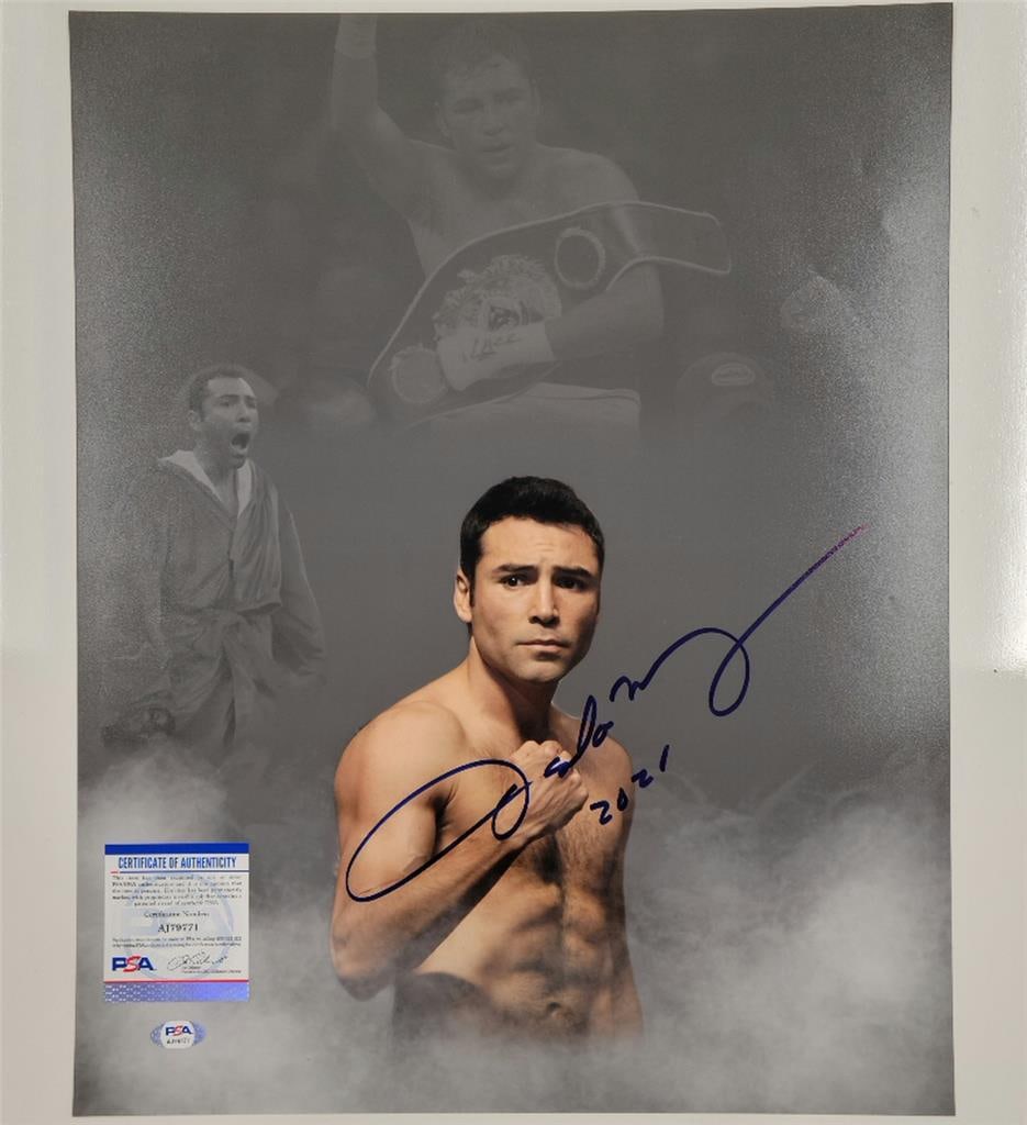 Oscar De La Hoya Autographed 16x20 Boxing Photo PSA/DNA Certified: Oscar De La Hoya Autographed 16x20 Boxing Photo PSA/DNA Certified This is an original 16x20 photo of boxing champion Oscar De La Hoya, featuring his authentic signature. The photo has been professiona