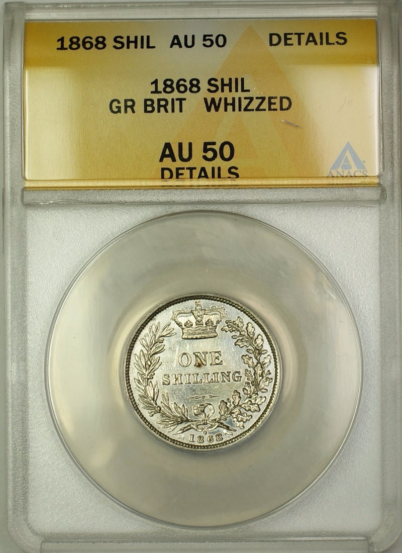 1868 United Kingdom 1 Shilling Silver Coin ANACS AU-50 Details Whizzed: 1868 United Kingdom 1 Shilling Silver Coin ANACS AU-50 Details Whizzed This 1868 Die 9 Great Britain 1 shilling coin is composed of silver and certified by ANACS with a grade of AU-50 Details. It is a