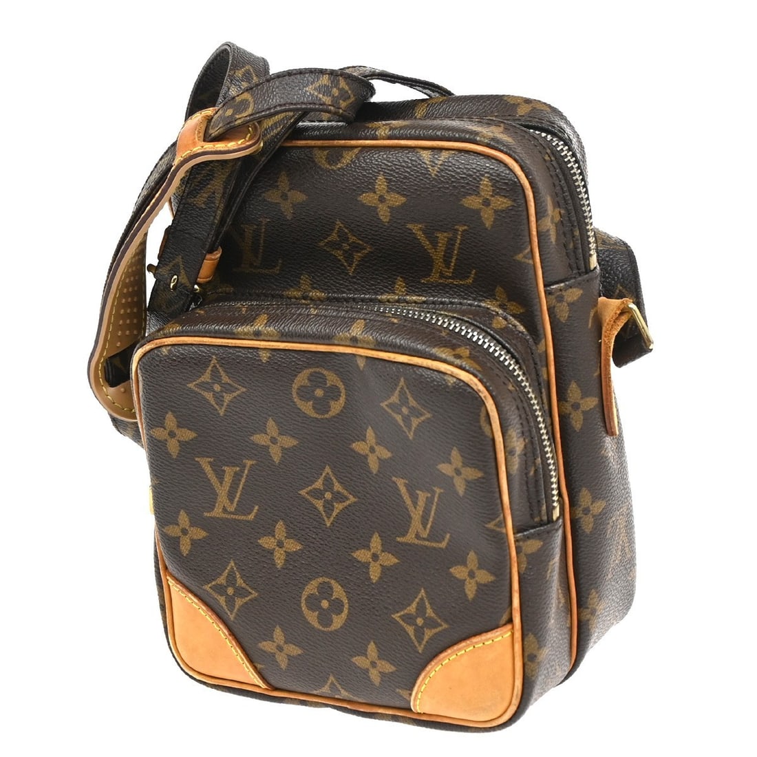 Amazone Crossbody Bag in Brown Monogram Canvas by Louis Vuitton: Amazone Crossbody Bag in Brown Monogram Canvas by Louis Vuitton This Louis Vuitton Amazone Bag features the iconic Monogram Canvas in a brown color, designed for unisex use. It originates from France 