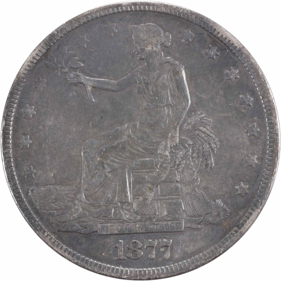 1877 Trade Silver Dollar by William Barber Uncertified Coin: 1877 Trade Silver Dollar by William Barber Uncertified Coin This 1877 Trade Silver Dollar is an attractive piece for collectors, featuring a striking design by William Barber. The coin is made of 90% 