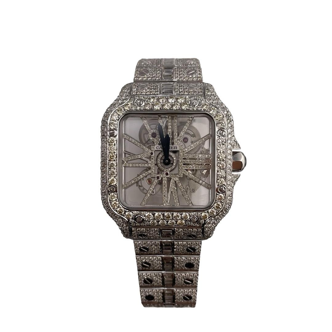 Santos Skeleton 4109 Diamond Dial and Baguette Bracelet with Papers 2021: Santos Skeleton 4109 Diamond Dial and Baguette Bracelet with Papers 2021 This Cartier Santos Skeleton watch, reference 4109, features a diamond-set dial, diamond bezel, and a bracelet adorned with dia