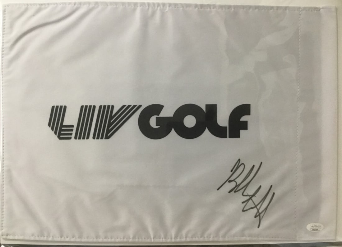 Bubba Watson Signed LIV Golf Pin Flag JSA AK33260: Bubba Watson Signed LIV Golf Pin Flag JSA AK33260 Celebrate the world of golf with this officially licensed LIV Golf pin flag, signed by the legendary golfer Bubba Watson. This original piece comes wi
