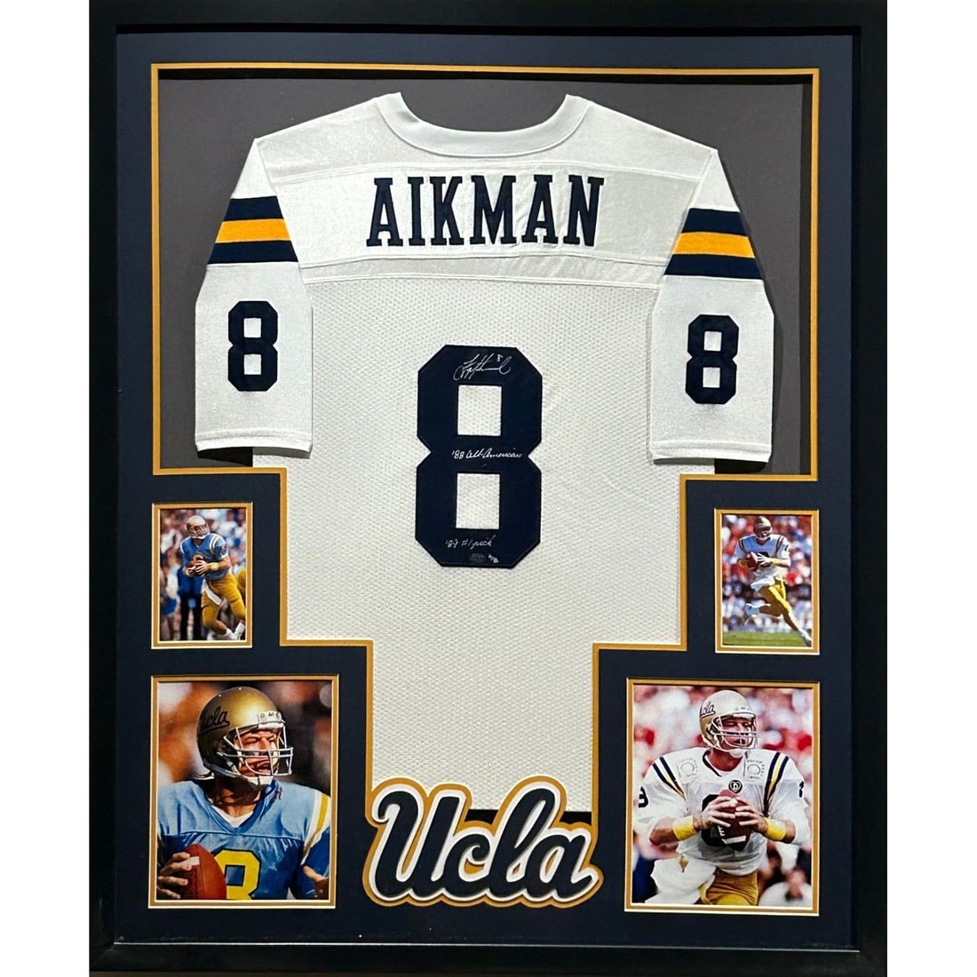 Troy Aikman Signed Framed UCLA Jersey GTSM Authenticated Dallas Cowboys: Troy Aikman Signed Framed UCLA Jersey GTSM Authenticated Dallas Cowboys Celebrate a piece of sports history with this Troy Aikman signed UCLA white jersey. Authenticated by GTSM, a leader in sports me