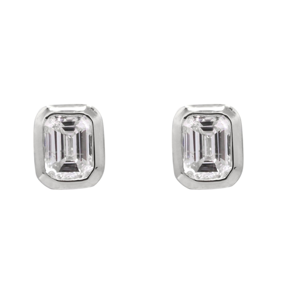Emerald Cut Diamond Earrings in 18K White Gold Bezel Setting: Emerald Cut Diamond Earrings in 18K White Gold Bezel Setting These elegant earrings feature emerald-shaped diamonds in a bezel set design, crafted from 18K white gold. With a total diamond weight of 0