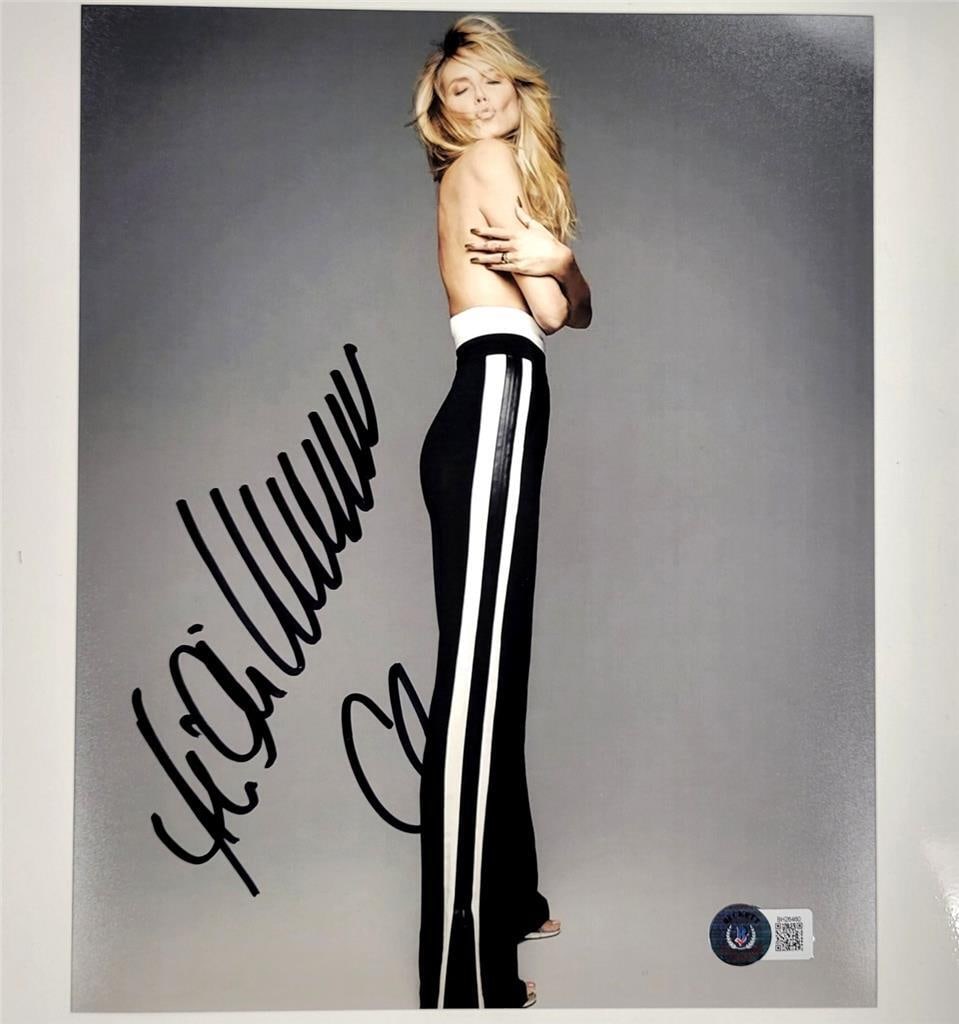 Heidi Klum Autographed 8x10 Photograph Authenticated by Beckett BAS: Heidi Klum Autographed 8x10 Photograph Authenticated by Beckett BAS This is an original 8x10 photo signed by model Heidi Klum. The autograph is authenticated by Beckett and features a Beckett BAS holo