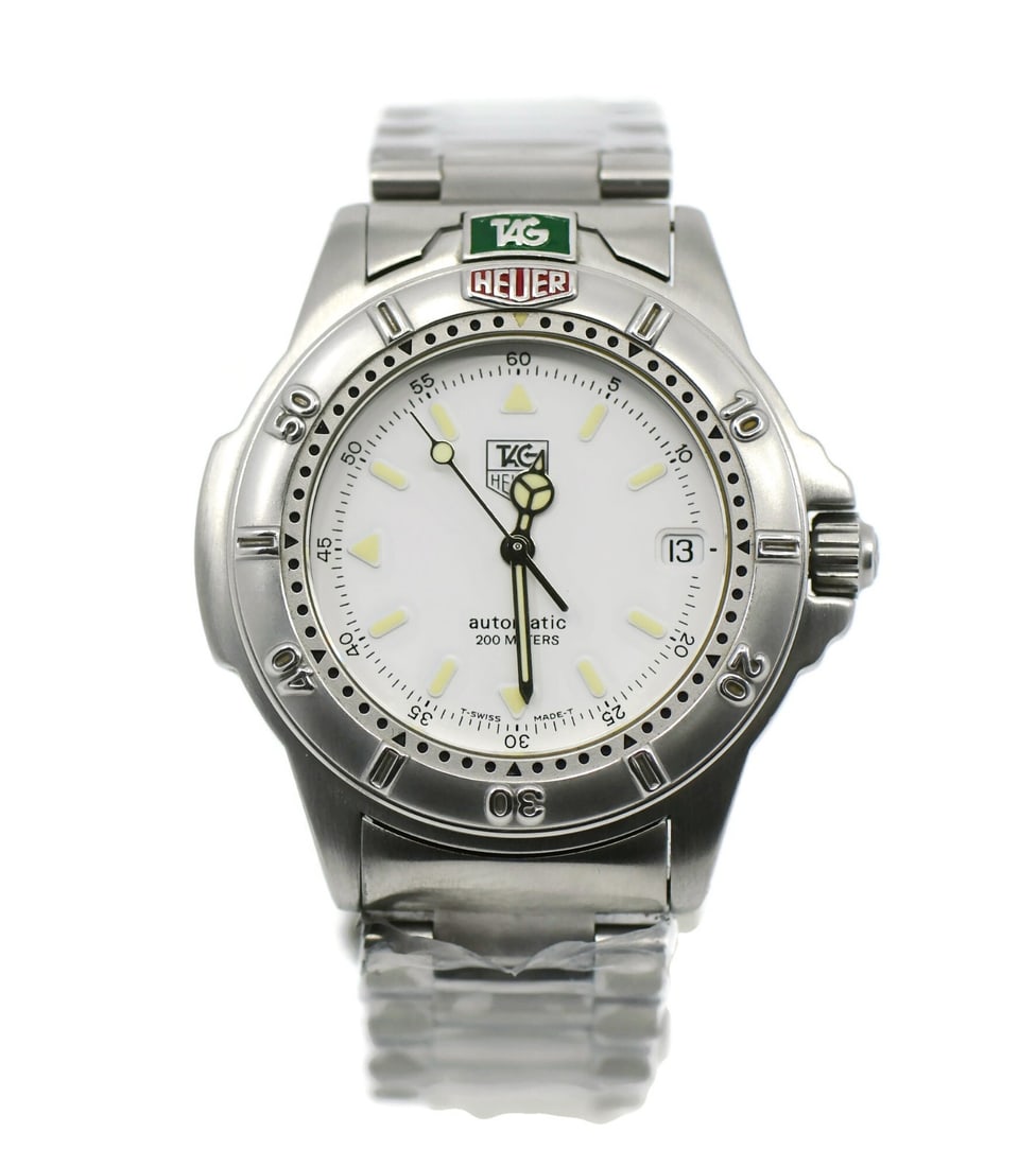 TAG Heuer 4000 Quartz Stainless Steel WF2110 Watch with Box and Papers: TAG Heuer 4000 Quartz Stainless Steel WF2110 Watch with Box and Papers This TAG Heuer 4000 Series wristwatch features a stainless steel case and band, a white analog dial, and reliable quartz movement