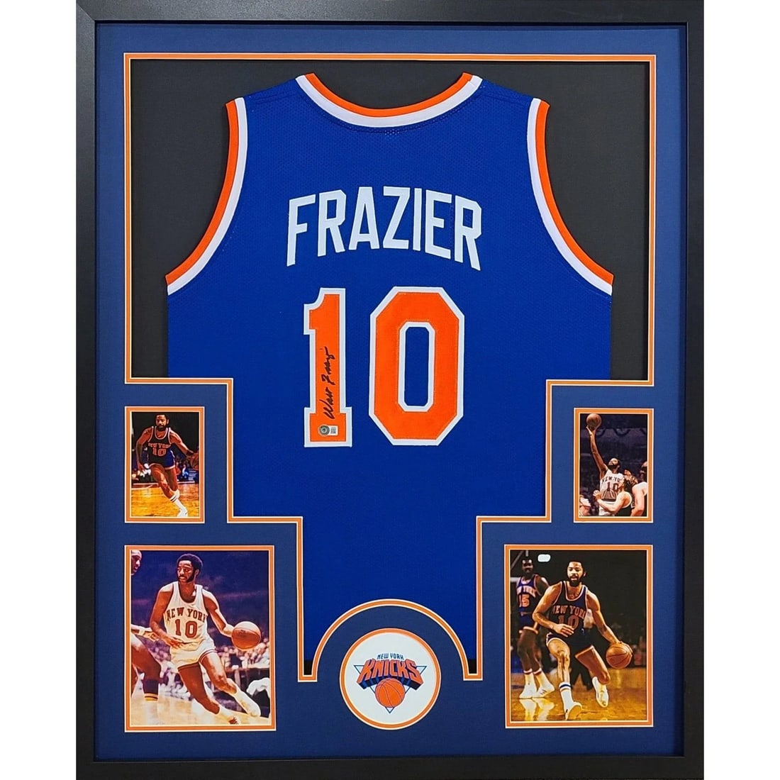Framed New York Knicks Jersey Signed by Walt Frazier Beckett Authenticated: Framed New York Knicks Jersey Signed by Walt Frazier Beckett Authenticated This framed New York Knicks jersey features the authentic autograph of Walt Frazier, verified by Beckett authentication with 
