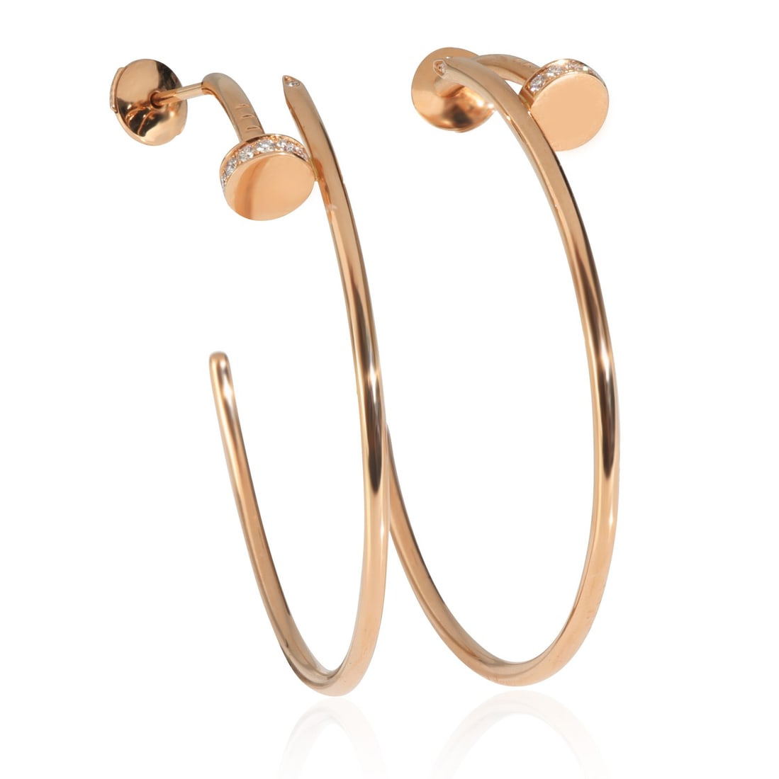 Juste Un Clou Large Rose Gold Diamond Hoop Earrings by Cartier: Juste Un Clou Large Rose Gold Diamond Hoop Earrings by Cartier These Cartier Juste Un Clou large model hoop earrings feature 18k rose gold and are adorned with round brilliant cut white diamonds total