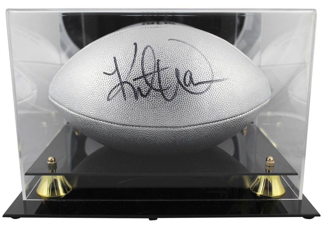 Kurt Warner Autographed Wilson Silver Replica Football With Display Case Beckett BAS: Kurt Warner Autographed Wilson Silver Replica Football With Display Case Beckett BAS This is an official Wilson Replica Duke Metallic Silver Football personally signed by Kurt Warner. The autographed 