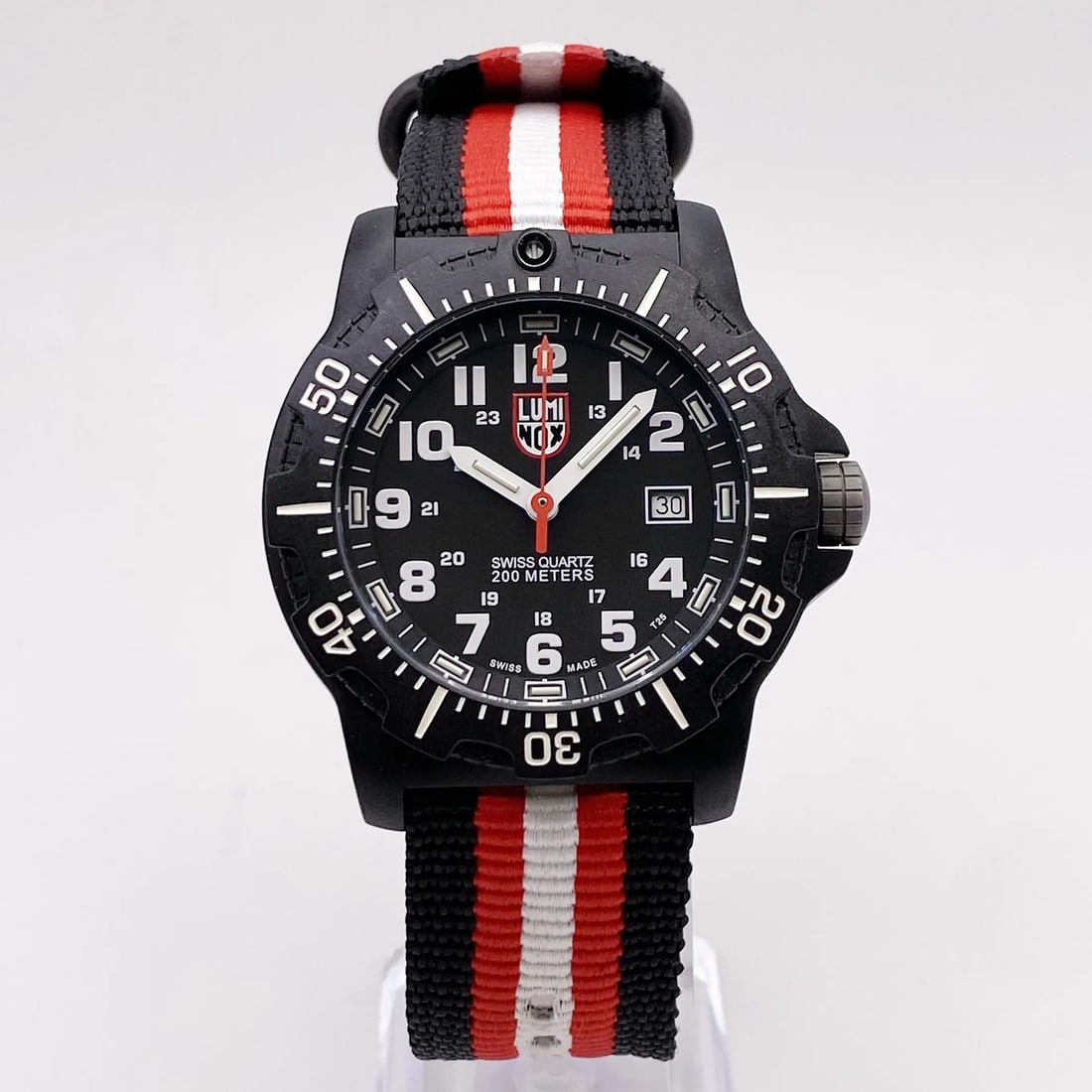 Luminox Black OPS 45mm Carbon Quartz Watch Water Resistant 200m: Luminox Black OPS 45mm Carbon Quartz Watch Water Resistant 200m Introducing the Luminox Black OPS wristwatch, designed for those who appreciate durability and functionality. This casual style timepiec